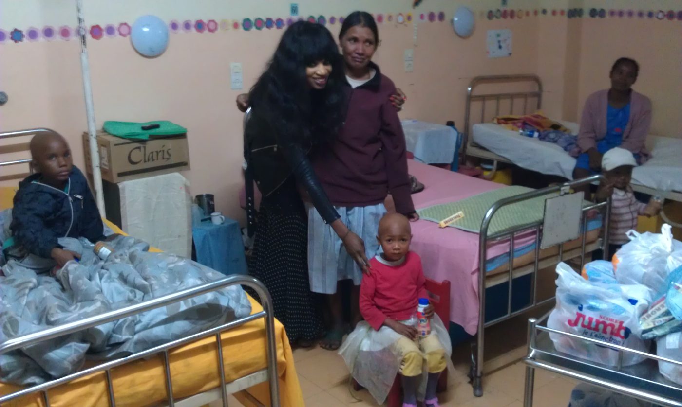 Irene Malin visiting a children's hospital ward in Madagascar